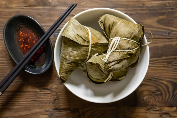 Zongzi, a traditional food for dragon boat festival and chili — Stock Photo, Image