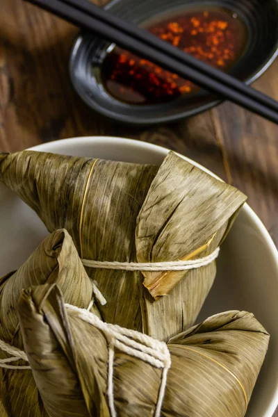 Zongzi, a traditional food for dragon boat festival and chili — Stock Photo, Image