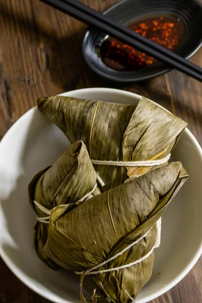 Zongzi, a traditional food for dragon boat festival and chili — Stock Photo, Image