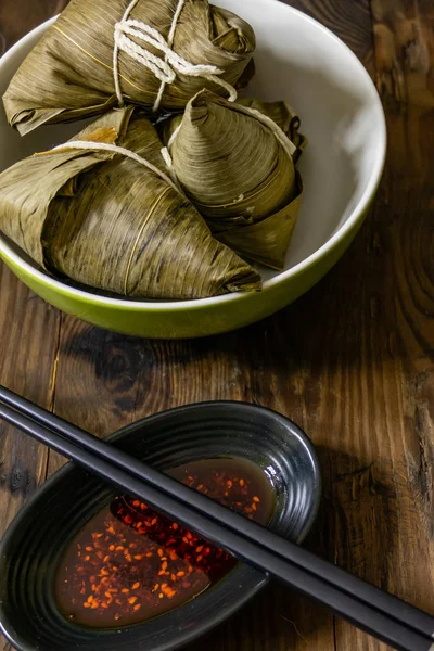 Zongzi, a traditional food for dragon boat festival and chili — Stock Photo, Image