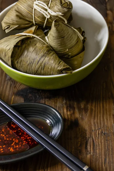 Zongzi, a traditional food for dragon boat festival and chili — Stock Photo, Image