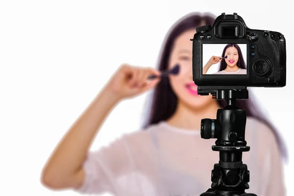 Focus on live view on camera on tripod, teenage girl   with blur — Stock Photo, Image