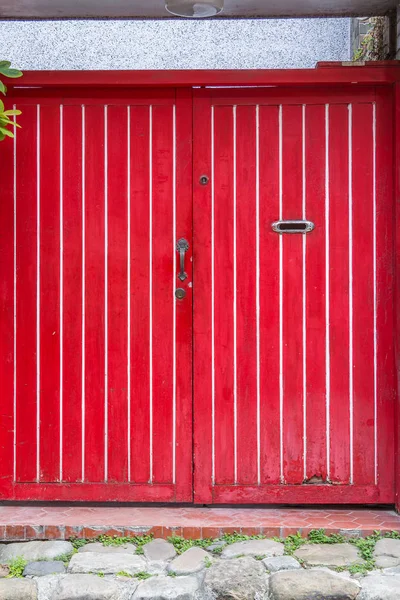Red wooden panel double doors with mail slot — Stock Photo, Image