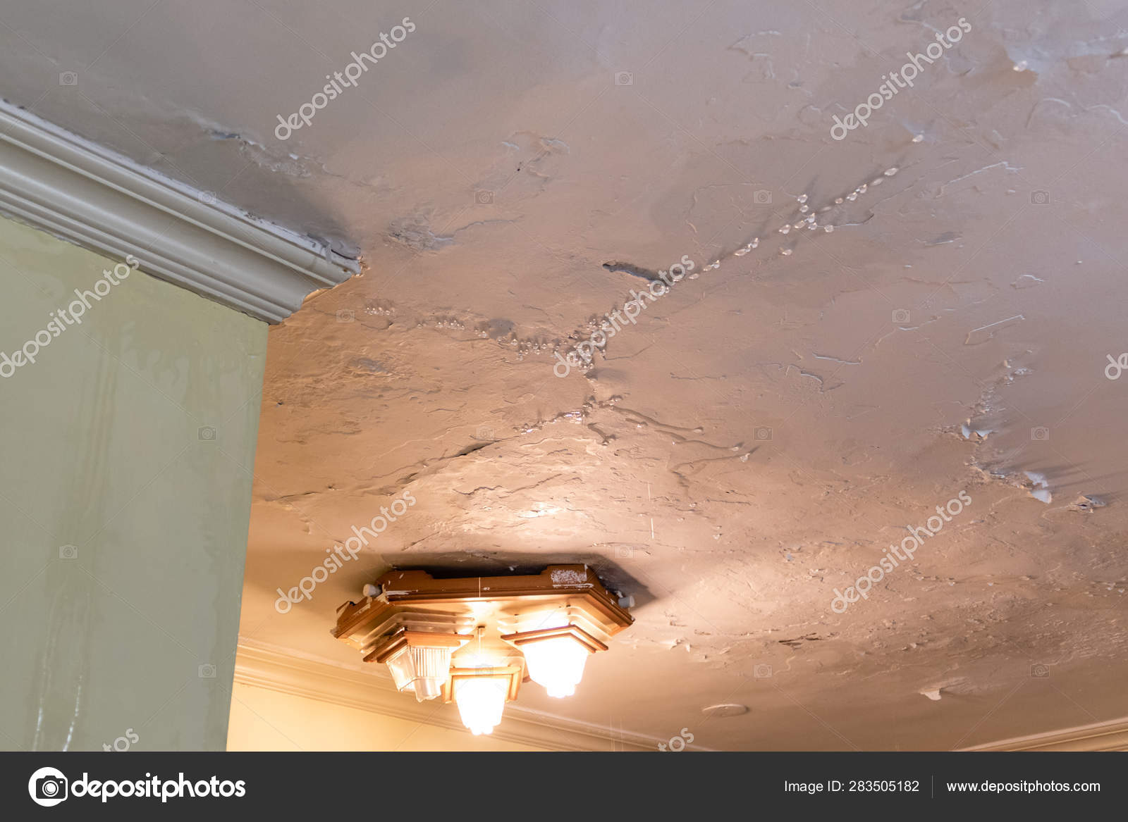 Water Dripping From Leaking Ceiling Stock Photo