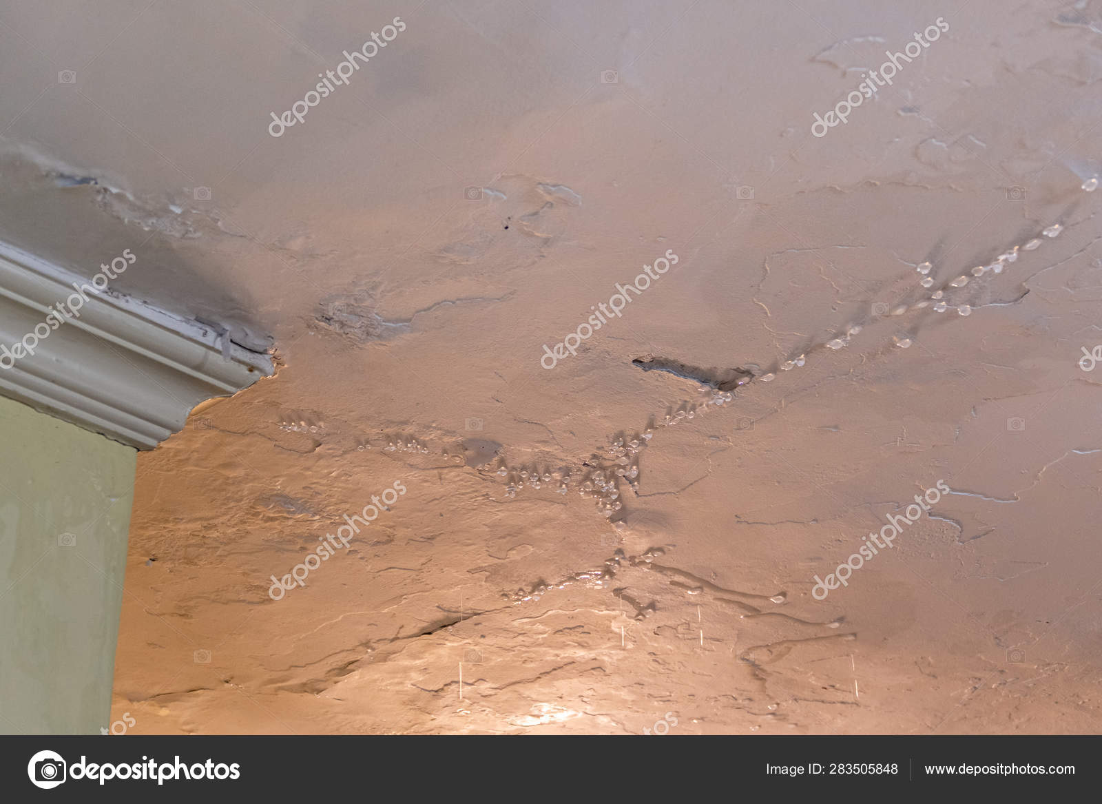 Water Dripping From Leaking Ceiling Stock Photo