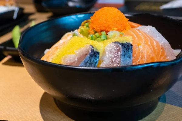 Sashimi bowl with fish eggs and rice