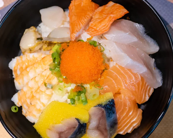 Sashimi bowl with fish eggs and rice