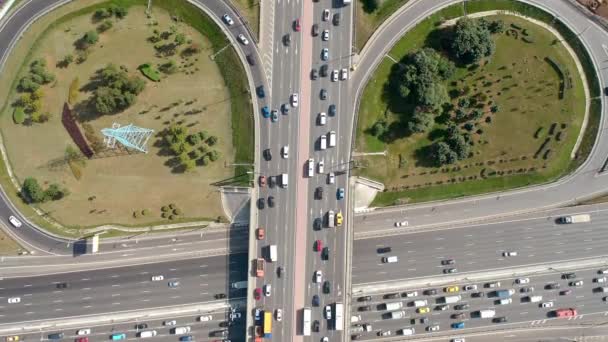 Top view from drone on overpass with road traffic. Summer time. Slow motion. — Stock Video