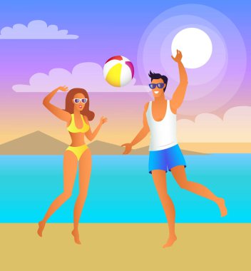 Erkek ve kadın tropikal plaj voleybol oynamak