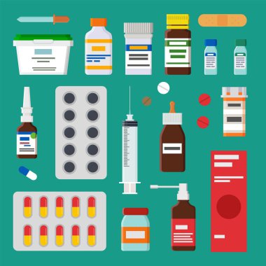 Yeşil zemin üzerinde izole ilaçlar koleksiyonu