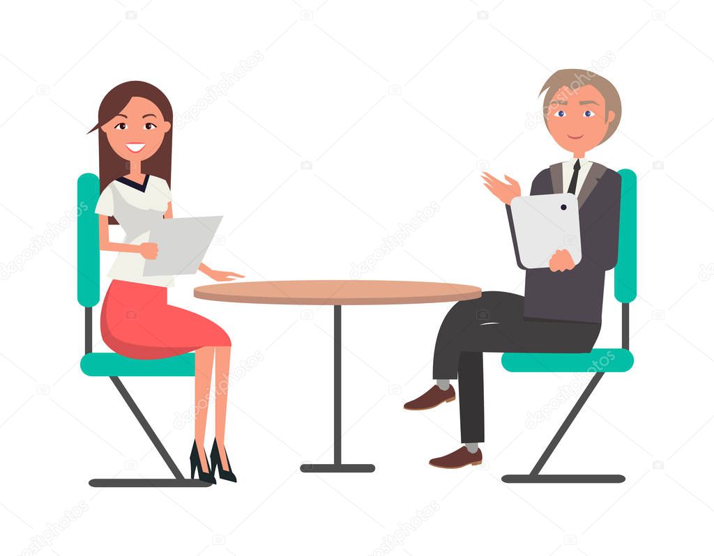 Man and Woman on Business Meeting at Round Table