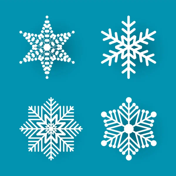 Kerst papier knippen vier witte sneeuwvlokken Vector — Stockvector