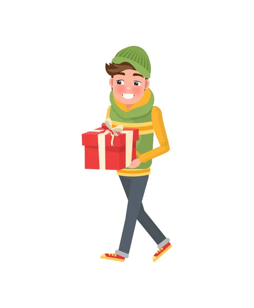 Junge mit verpacktem Geschenk, in Mütze und Schal, Vektor — Stockvektor