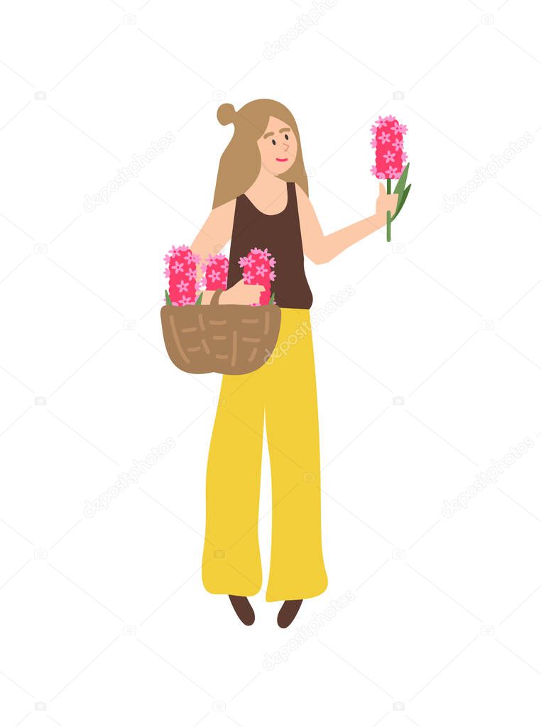 Woman Holding Hyacinth Flowers in Woven Basket