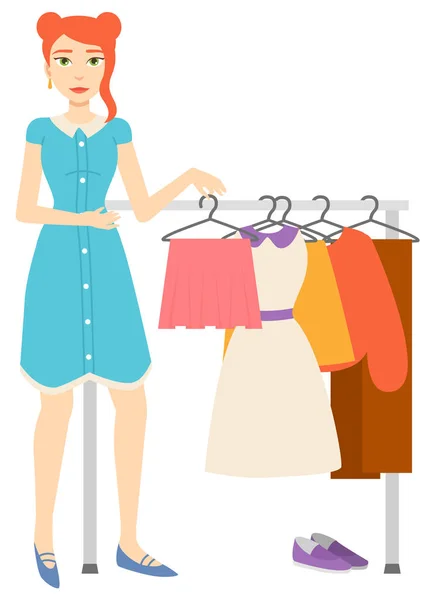 Γυναίκα αγοράζοντας ρούχα, ψώνια θηλυκό χαρακτήρα — Διανυσματικό Αρχείο