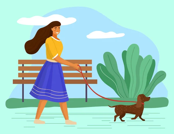 Walk with dog in the park. Woman is going with a doggy in garden. A happy pet running with the owner