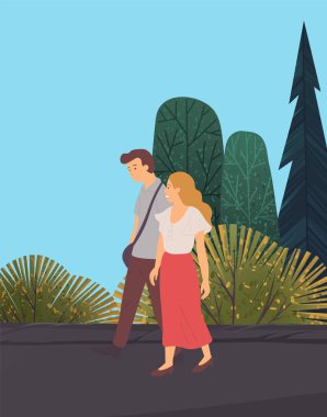 Ormanda yürüyen bir çift insan. Doğanın güzelliğine hayran. Etkin bir yaşam tarzı.