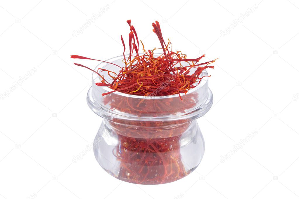 Saffron in bowl isolated on white background