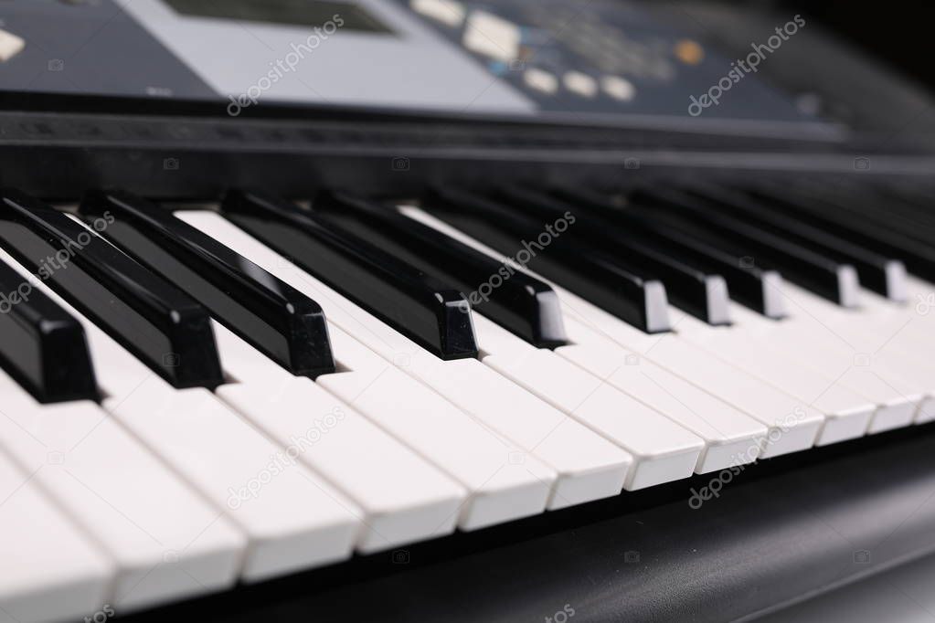 Piano  keyboard instrument, composition on a white background.