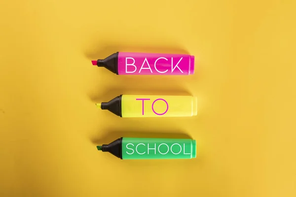 Back to school. Colorful highlighter on a yellow background. — Stock Photo, Image