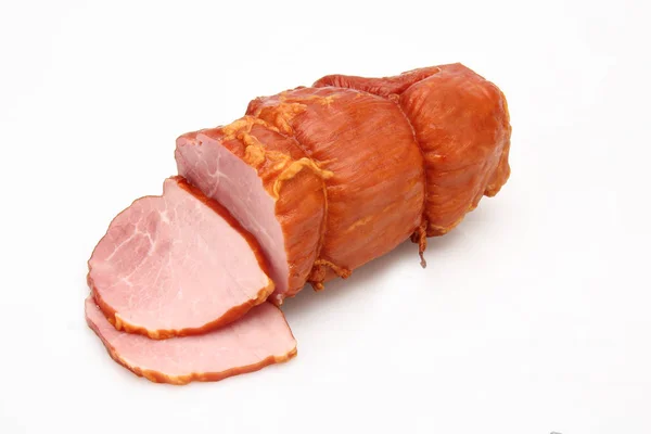 Varkenshaas. Koud vlees op een witte achtergrond. — Stockfoto