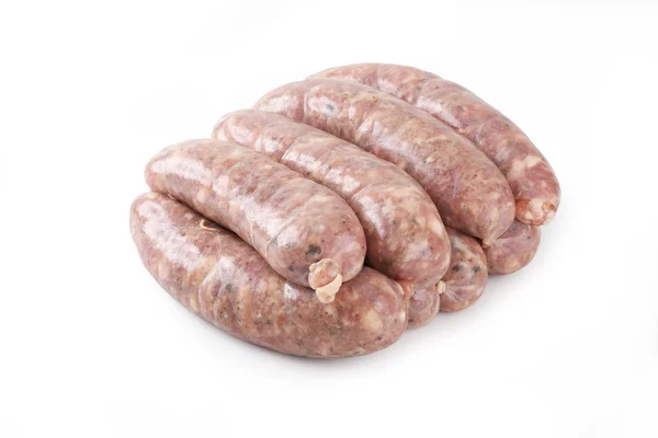 Salsiccia bianca cruda su sfondo bianco. Prodotti alimentari . — Foto Stock