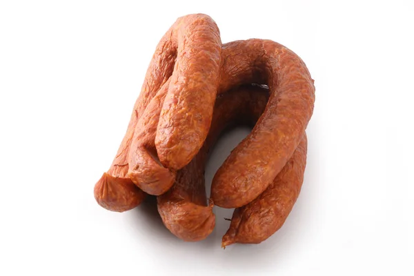 Dünne Wurst auf weißem Hintergrund. Lebensmittel. — Stockfoto