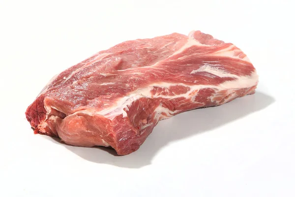 Pork neck. Raw meat on a white background. — Stock Photo, Image