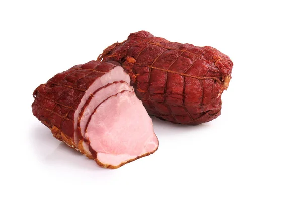 Ham, alsjeblieft. Gerookte varkensvleesham zonder been in netten. Vleeswaren van varkensvlees. Geïsoleerd op een witte achtergrond. — Stockfoto