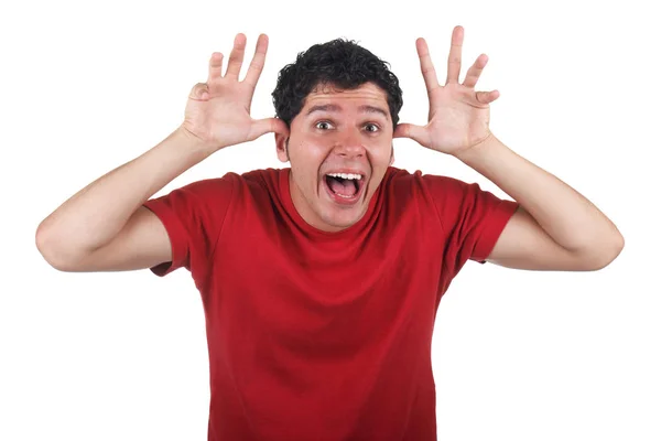 Young man making funny faces Stock Image