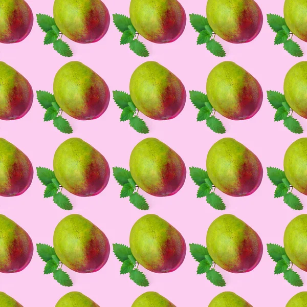 Mango seamless pattern with green mint leaves made of photography on pastel background.