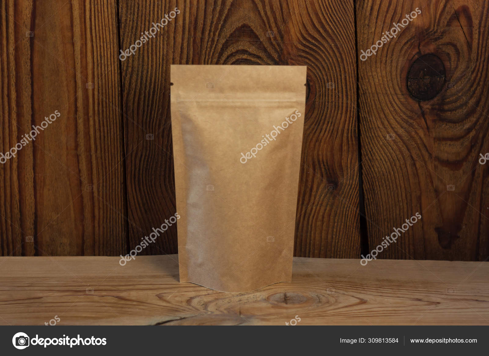 Download Brown Kraft Paper Pouch Bags With Coffee Beans Front View On A Wooden Background Stock Photo Image By C Kawaiis 309813584