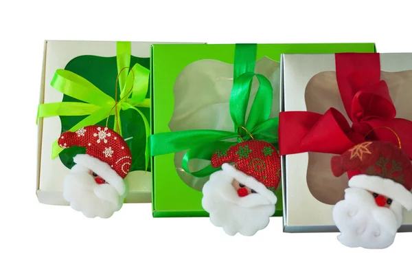 Gift boxes with windows and ribbons isolated on a white background. Royalty Free Stock Photos