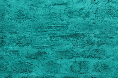 Kırmızı tuğla duvar dokusunda eski mavi alçı. Retro macun bina arkaplan kopyalama alanı. Şık bir turkuaz yüzey, ayrıntılı taş zemin. Metin tasarımı için duvar kağıdı desenli ekran koruyucu öngörünümü.