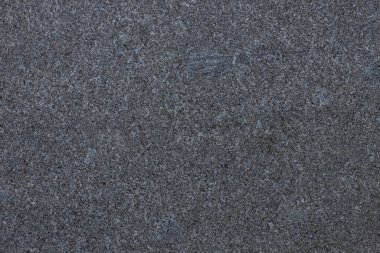 Mutfak atölyesi, masa, pencere pervazı, çit için kullanılan koyu gri granit arka plan. Siyah ve beyaz volkanik taş dokusu. Metin tabelası reklam tasarımı modeli. Mimari detay doğal arkaplan