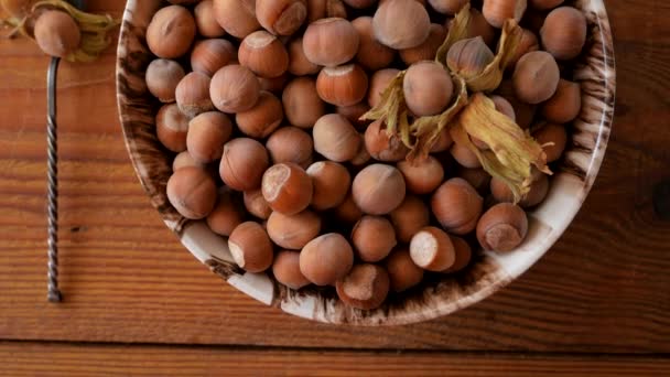 Hazelnuts Porcelain Bowl Nutcracker Rustic Wooden Background Raw Fresh Homegrowing — Stock Video