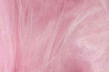 Pembe tül kumaş dokusu üst görünümü. Mercan arka planı. Moda rengi trendleri kadınsı etek düz yatış, metin işaretleri için kadın blog arkaplanı arzu. Kız soyut duvar kağıdı, tekstil yüzeyi.