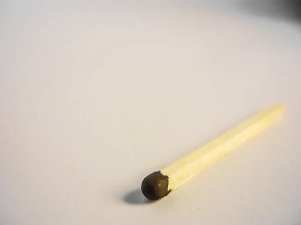 one match on white background