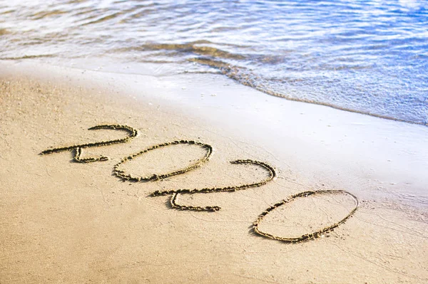 Happy New Year 2020 Text Lettering Sand Beach Blue Wave — Stock Photo, Image