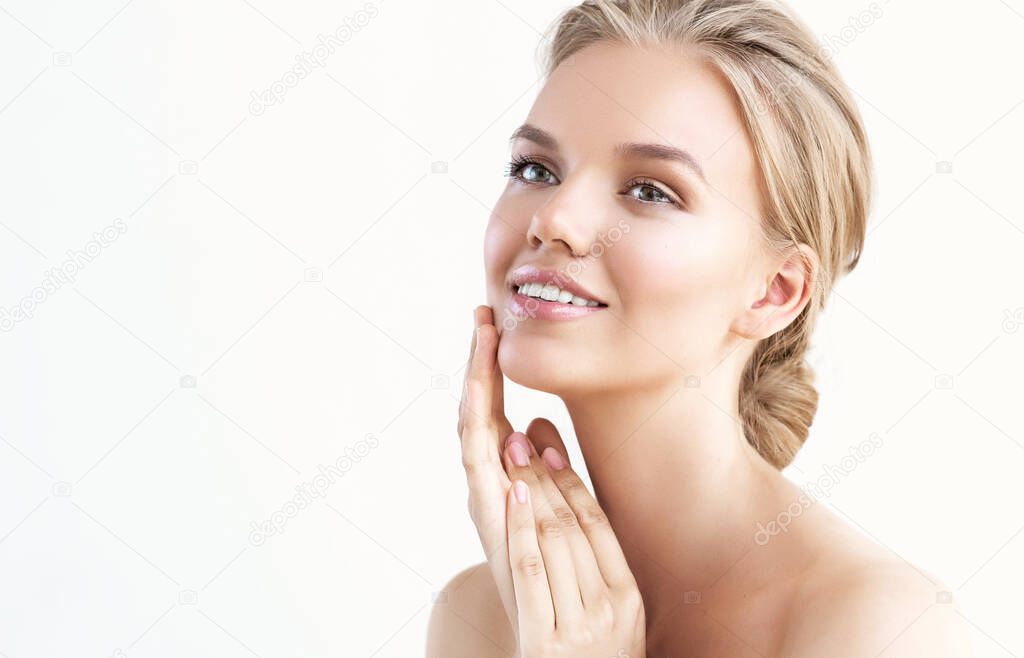 Beautiful young woman with clean fresh skin .