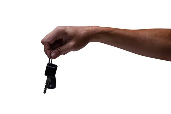 Beyaz arka plan üzerinde izole araba anahtarları tutan adam el. Yakın çekim — Stok fotoğraf