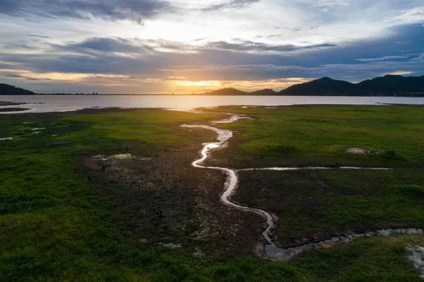 Aerial view landscape nature Water flow to river and grass backg — Stock Photo, Image