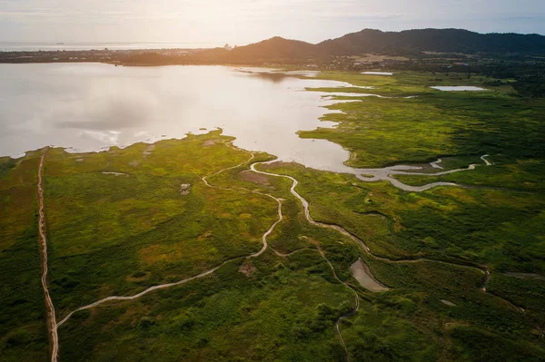 Aerial view landscape nature Water flow to river and grass backg