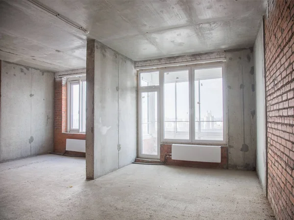 Concrete and brick walls in the apartment for repair