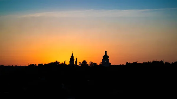 Summer or early autumn park at sunset