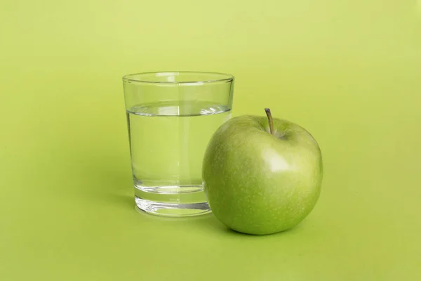 A Glass Cup Of Water And A Green Apple On A Green Table Abstract Background Stock Images Page Everypixel A Glass Cup Of Water And A Green Apple On A Green Table Abstract Background Stock Images Page Everypixel