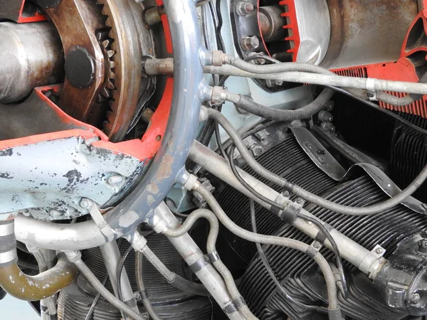 Parts of the old aircraft engine. Nuts connecting tubes, nozzles, cylinders, insulation of the combustion chamber.