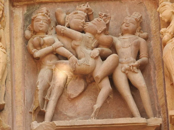 The Western group of Khajuraho temples, a UNESCO heritage site, is famous for its erotic sculptures, India, clear day.