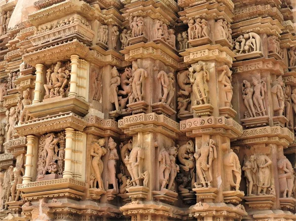 The Western group of Khajuraho temples, a UNESCO heritage site, is famous for its erotic sculptures, India, clear day.