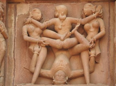 Erotic sculptures and sex poses of man in kajuraho temples, Madhya Pradesh, India. Built around 1050, it is a UNESCO world heritage site, a tourist destination. The concept of textures and postcards. clipart